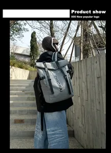 Outdoor street style roll-top waterproof backpack detail showcasing adjustable straps.