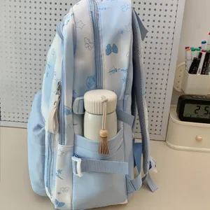 Lichtblauwe schoolrugzak met leuke strik ster print, casual reistas voor dagelijks.