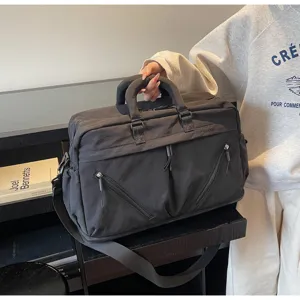 Large capacity travel duffel bag with shoulder strap, ideal for short trips and daily fitness.