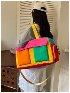 Colorful colorblocked travel duffel bag for women, fashion casual gym shoulder handbag.
