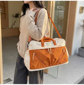Large capacity travel duffel bag, casual canvas expandable luggage bag for women and sports.