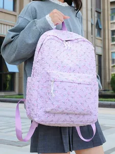 Lichtpaarse bloemige schoolrugzak voor meisjes, frisse college stijl casual tas dagelijks.