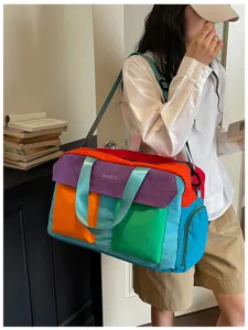 Colorful dopamine duffel travel bag, multi-color patch design for gym and weekend trips.