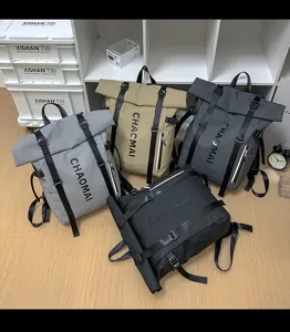 Four color waterproof roll-top backpacks displayed in detail shot for outdoor travel.