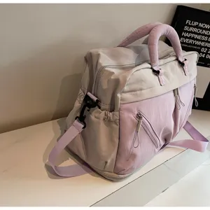 Large capacity travel duffel bag for women, short trip expandable luggage and gym bag.