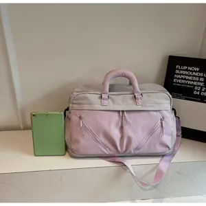 Large capacity travel duffel bag for women, short trip luggage bag with shoulder strap.