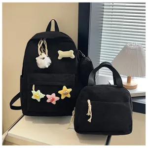 Set zaino in corduroy nero con adorabili ciondoli in peluche a stella, borsa scolastica casual ideale.