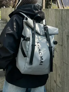 Street fashion roll-top waterproof backpack for men and women, casual outdoor travel daypack.