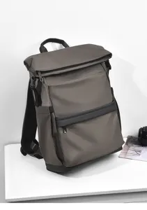 Detail view of a large capacity waterproof roll-top backpack, ideal for daily commute and travel.