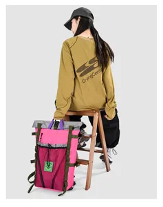Detailed outdoor color-block backpack view, highlighting multi-pocket mesh and durable straps.
