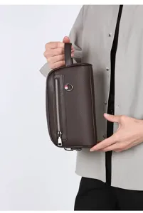 Pochette d'affaires pour homme avec poignée, détails de portefeuille de téléphone en cuir.