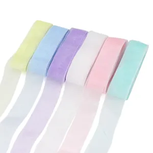 Colorful sheer organza ribbon rolls for gift wrapping, bows, and craft decorations.