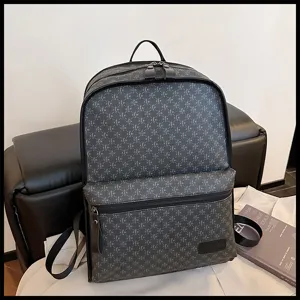 Mochila gris oscura elegante con patrón geométrico para viajes, trabajo y uso escolar diario.