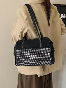 Zwarte schoudertas met strass steentjes, dubbele riemen en een prachtig sprankelend design.