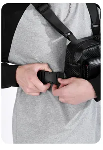 Tactical chest bag detail view, black streetwear vest pack with adjustable buckle straps.