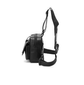 Black tactical chest rig bag with carbon fiber pattern, functional streetwear utility vest pack.