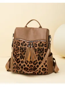 Vintage Damen Rucksack mit Leopardenmuster Quaste grosse Kapazitaet Freizeit Reise Tasche.
