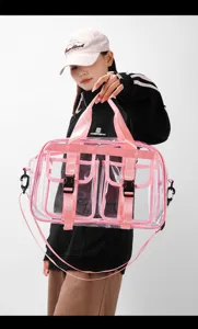 Transparente PVC Reisetasche mit rosa Riemen und Vordertaschen für Damen, stilvoll und groß.