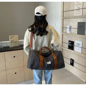 Grote canvas reistas duffel bag, stijlvolle sporttas met handige lederen handgrepen.