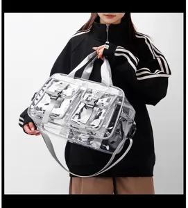 Transparente PVC Reisetasche Detail, grosse Kapazitaet wasserdichte Handtasche mit Gurten.