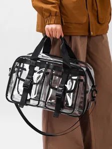Transparente PVC Reisetasche mit schwarzen Gurten und grossem Stauraum fuer Alltag und Reisen.