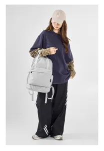 Lightweight grey plaid oxford backpack, large capacity foldable casual daypack for women.