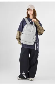 Lightweight grey grid oxford backpack for women, large capacity foldable casual daypack daily.