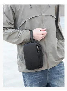 Borsa da polso in pelle PU nera da uomo pochette da viaggio borsa da toeletta portatile