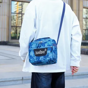 Blue camouflage insulated shoulder bag for outdoor travel casual use with zipper and label