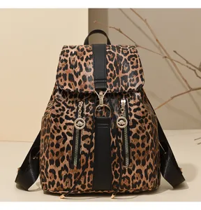 Detailed view of women leopard print backpack retro PU leather casual school bag fashion flap.