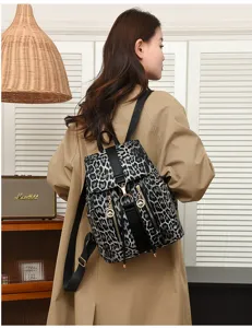 Fashion leopard print PU leather women backpack with flap closure, casual retro design for daily.