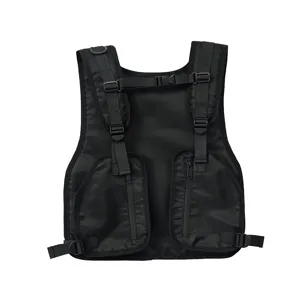 Tactical vest chest bag detail, black multi-pocket design with adjustable straps and secure zippers.