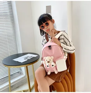 Zaino asilo rosa carino per bambini, con peluche di orsetto e tasca anteriore per scuola e viaggi.