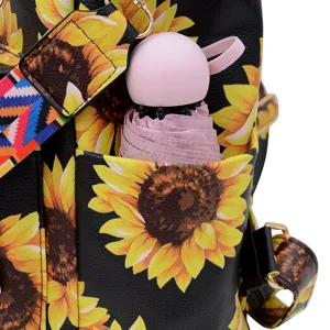 Zaino nero in pelle con stampa di girasole e ombrello rosa per donna viaggio quotidiano.