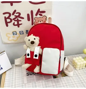 Zaino per bambini con orsetto dei cartoni animati, borsa scolastica rossa e bianca con peluche.