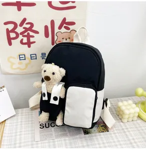 Zaino per bambini con simpatico orsetto dei cartoni animati borsa scolastica casual con bambola.