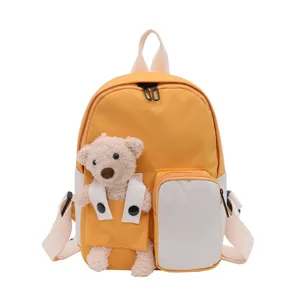 Zaino giallo per bambini con orsetto di peluche, borsa scolastica carina per uso quotidiano.