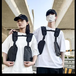 Outdoor tactical chest bag detail view, multi-pocket adjustable vest harness design.