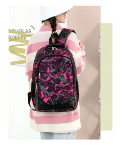Sac à dos élégant rose et noir avec graffiti pour école voyage loisir grande capacité.