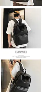 Sac à dos en cuir noir minimaliste pour hommes, grand sac de voyage et de loisirs idéal.