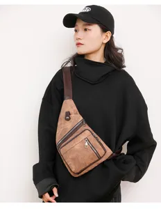 Stylish women's canvas sling chest bag with multi-pocket zipper design for casual daily wear.
