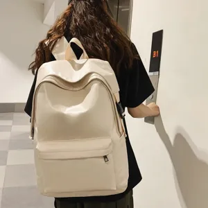 Sac à dos en cuir minimaliste de grande capacité pour les voyages et l'école quotidienne.