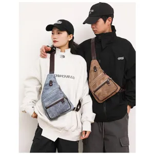 Detailed shot of casual sling chest bag worn by models, retro texture design with zippers.