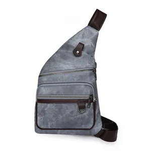 Casual gray canvas sling chest bag with brown leather trim and multi-pocket zippers.