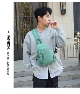 Casual nylon borsttas voor heren en dames, stijlvolle groene crossbody tas voor dagelijks gebruik.