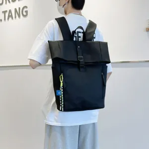 Minimalist black roll-top backpack for daily casual use, large capacity school bag.
