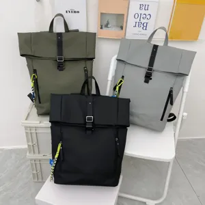 Casual large-capacity college student backpack, solid color roll-top design, stylish daily bag.
