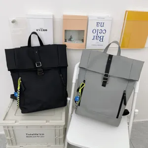 Stylish minimalist roll-top backpack with large capacity, ideal for campus and daily use.