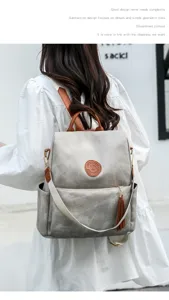 Modischer Damen Anti-Diebstahl PU-Leder Rucksack mit Quaste und minimalistischem Design.