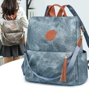 Damen Mode PU Leder Diebstahlschutz Rucksack Weich Casual Reise Rucksack Mehrzweck Schultasche Farbblock Quaste Rucksack Für Frauen